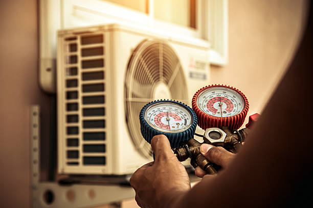 Professional Heat Pump Repair technician working in Grand Ridge, FL